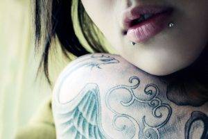 women model tattoo piercing lips