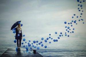 women model landscape nature balloons pier water sky clouds umbrella blonde