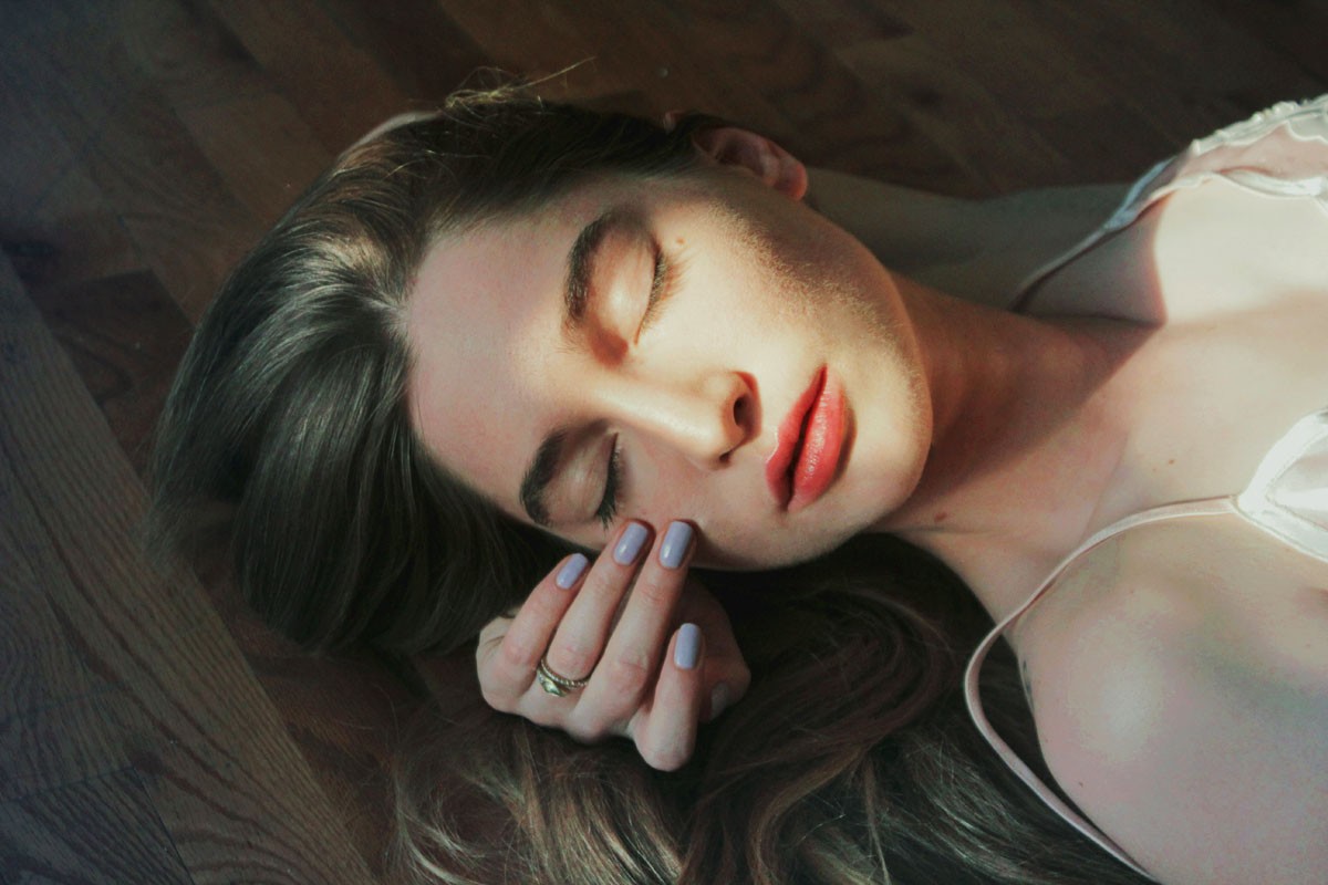 lying down women brunette sunlight closed eyes Wallpaper