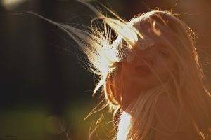 women blonde depth of field long hair women outdoors natural lighting hair in face