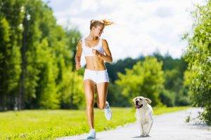 women fitness model blonde women outdoors dog running gym clothes sports bra