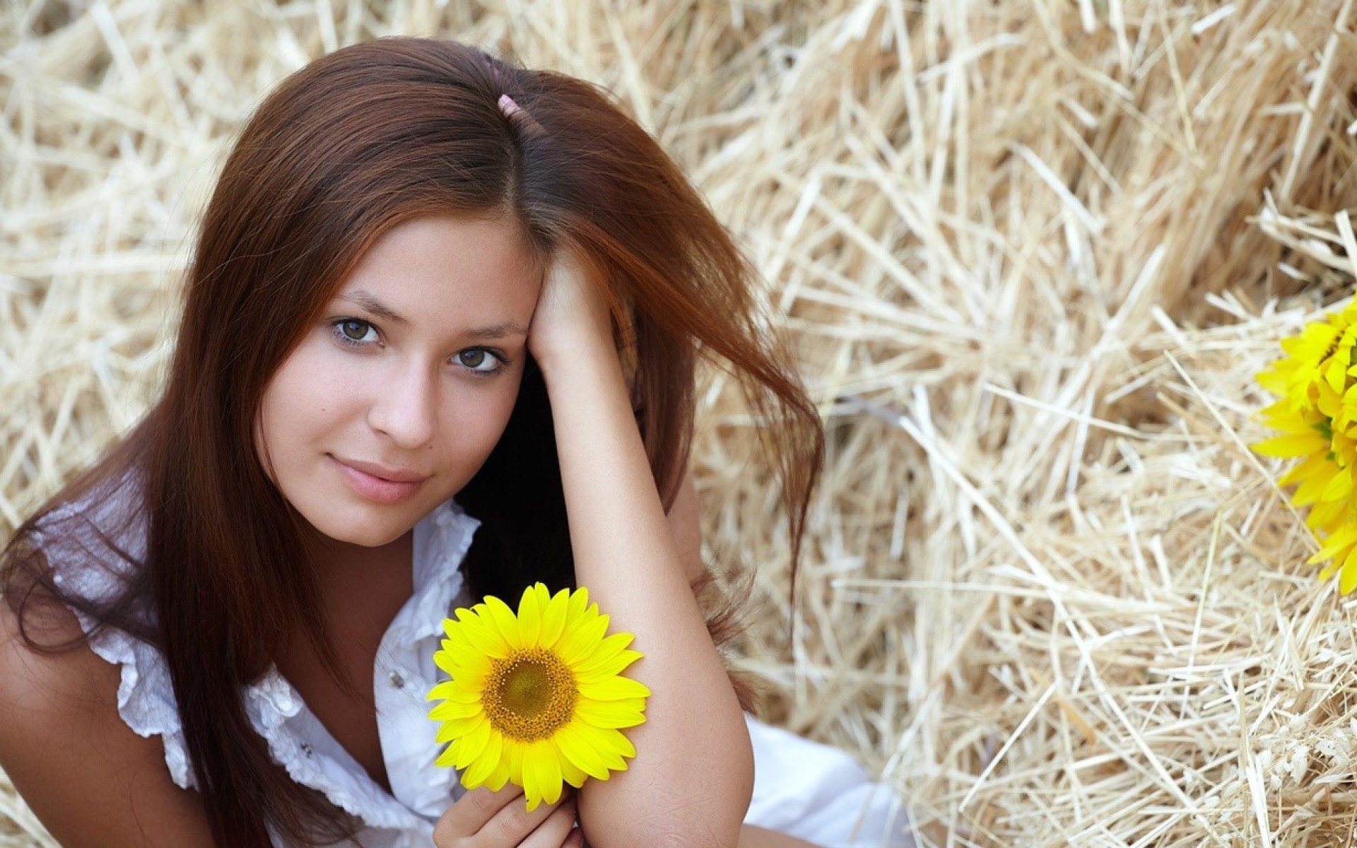 women model brunette long hair face smiling flowers white dress straw yellow flowers Wallpaper