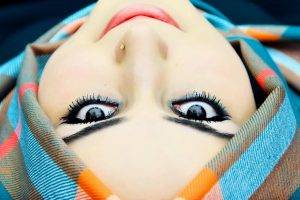 women model smiling face black eyes piercing upside down hijabs