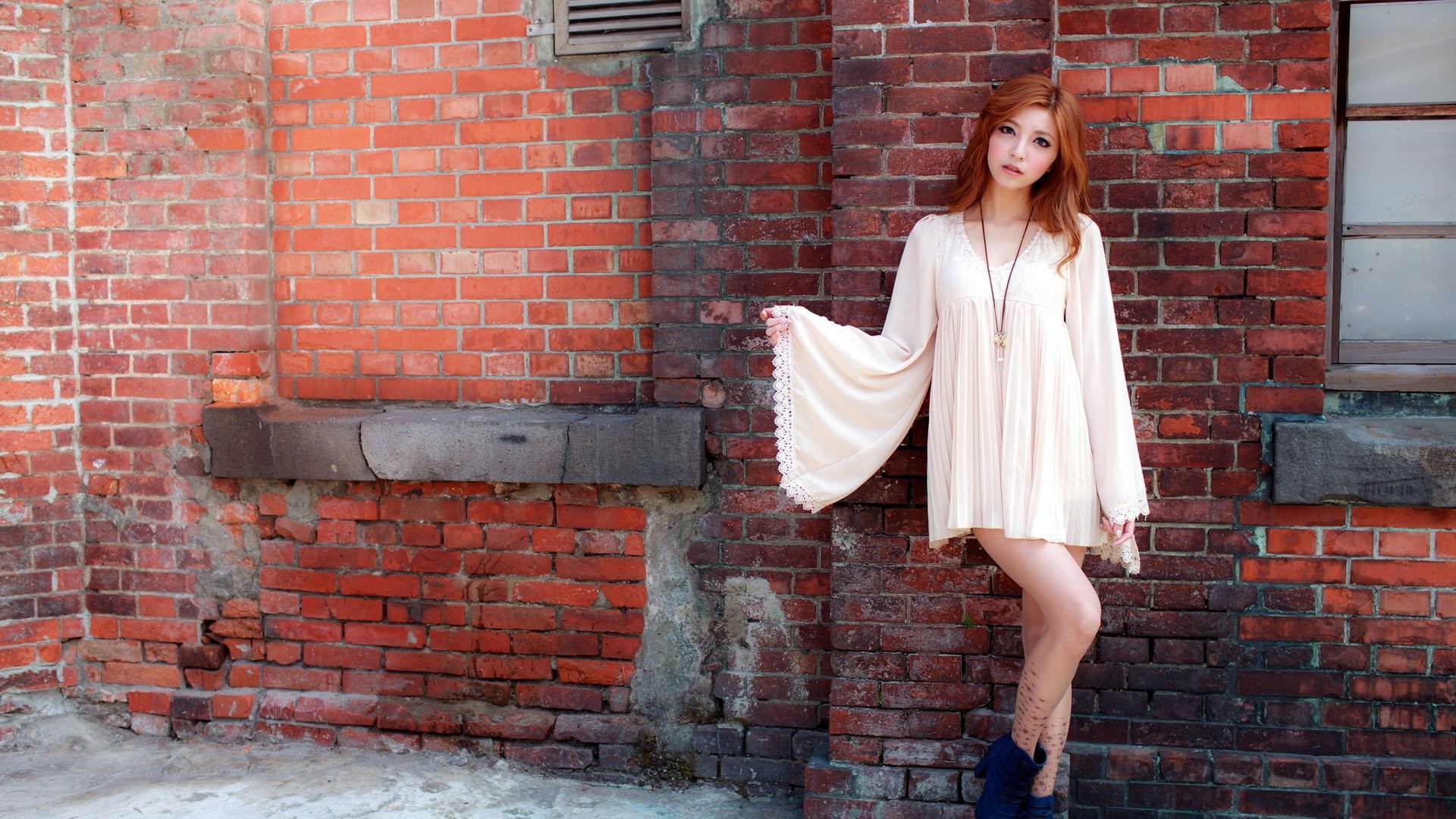 women model long hair asian redhead open mouth white dress women outdoors bricks Wallpaper