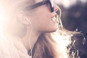 women blonde sunglasses long hair sunlight smiling closeup