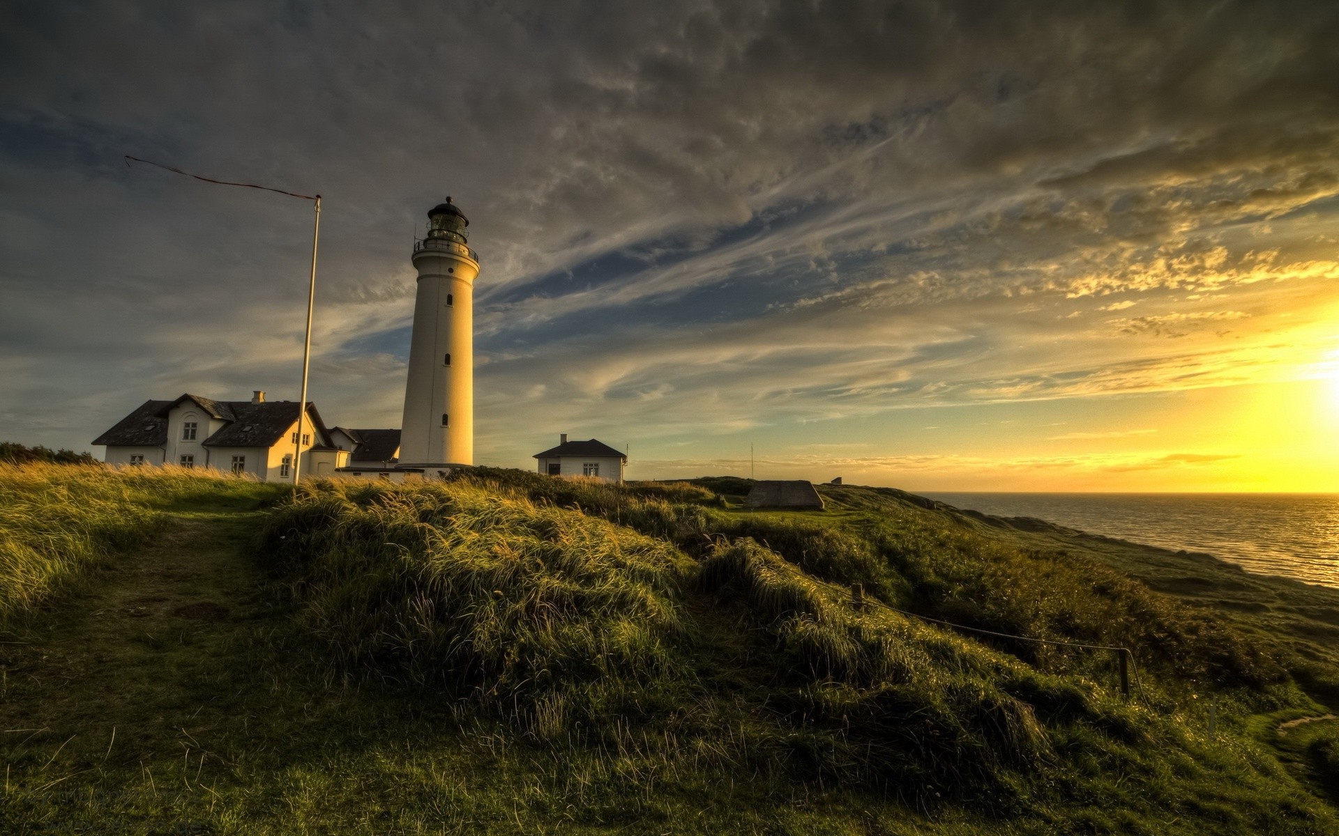 lighthouse, Water, Sunset, Grass, House, Photography, Flag, Clouds, Depth of field Wallpaper