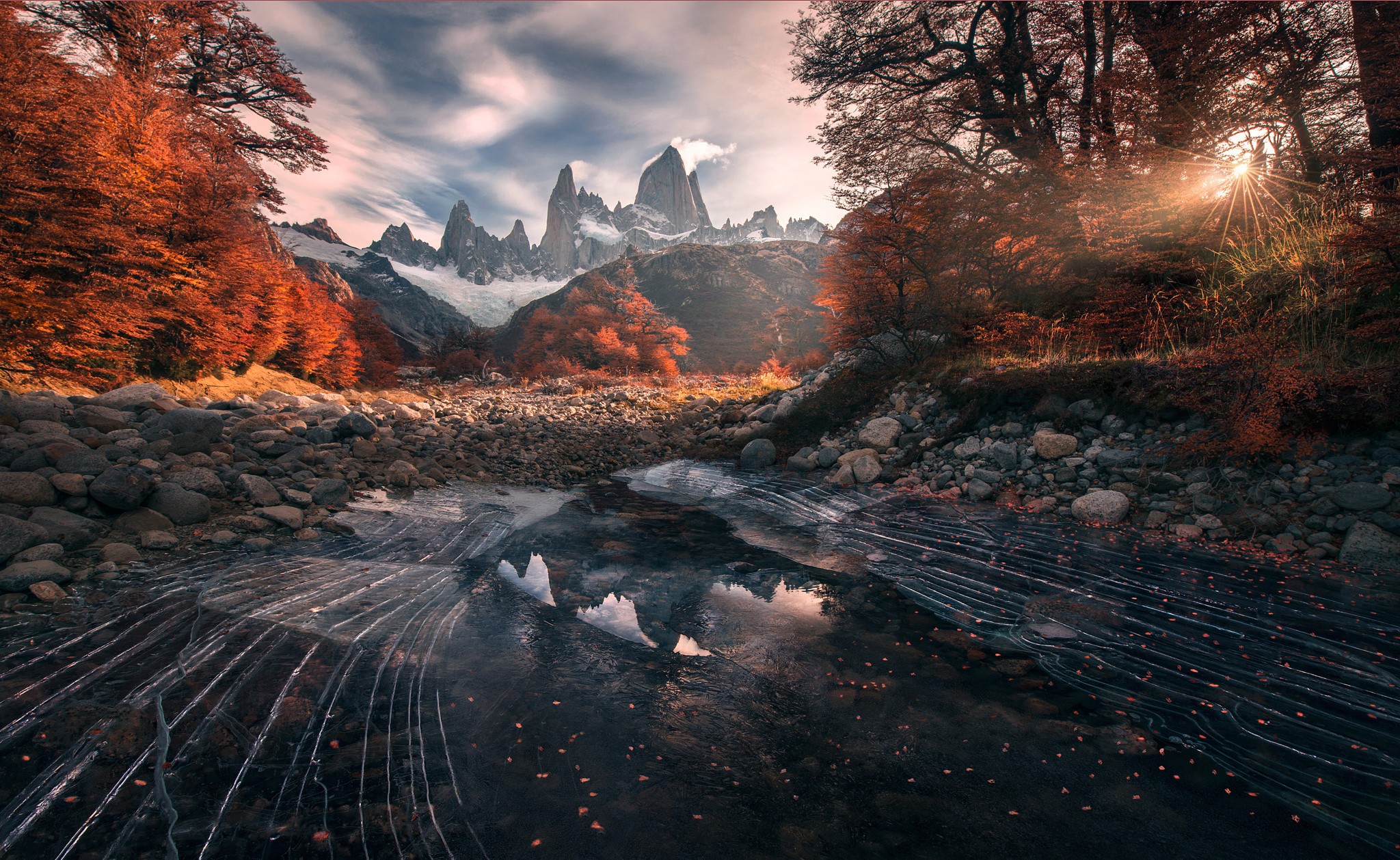 nature, Landscape, Water, Patagonia, Chile, Mountains, Trees, Forest, Fall, Clouds, Sun rays, Lake, Stones, Leaves, Ice, Frozen lake Wallpaper