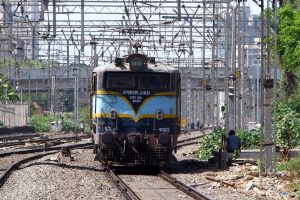 people, Electric locomotives, Tracks, Alone, India, Power lines, Signal, Pantograph