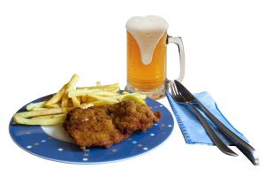 food, Dishes, French fries, Fork, Table knife, Napkin, Mugs, Beer, Foam