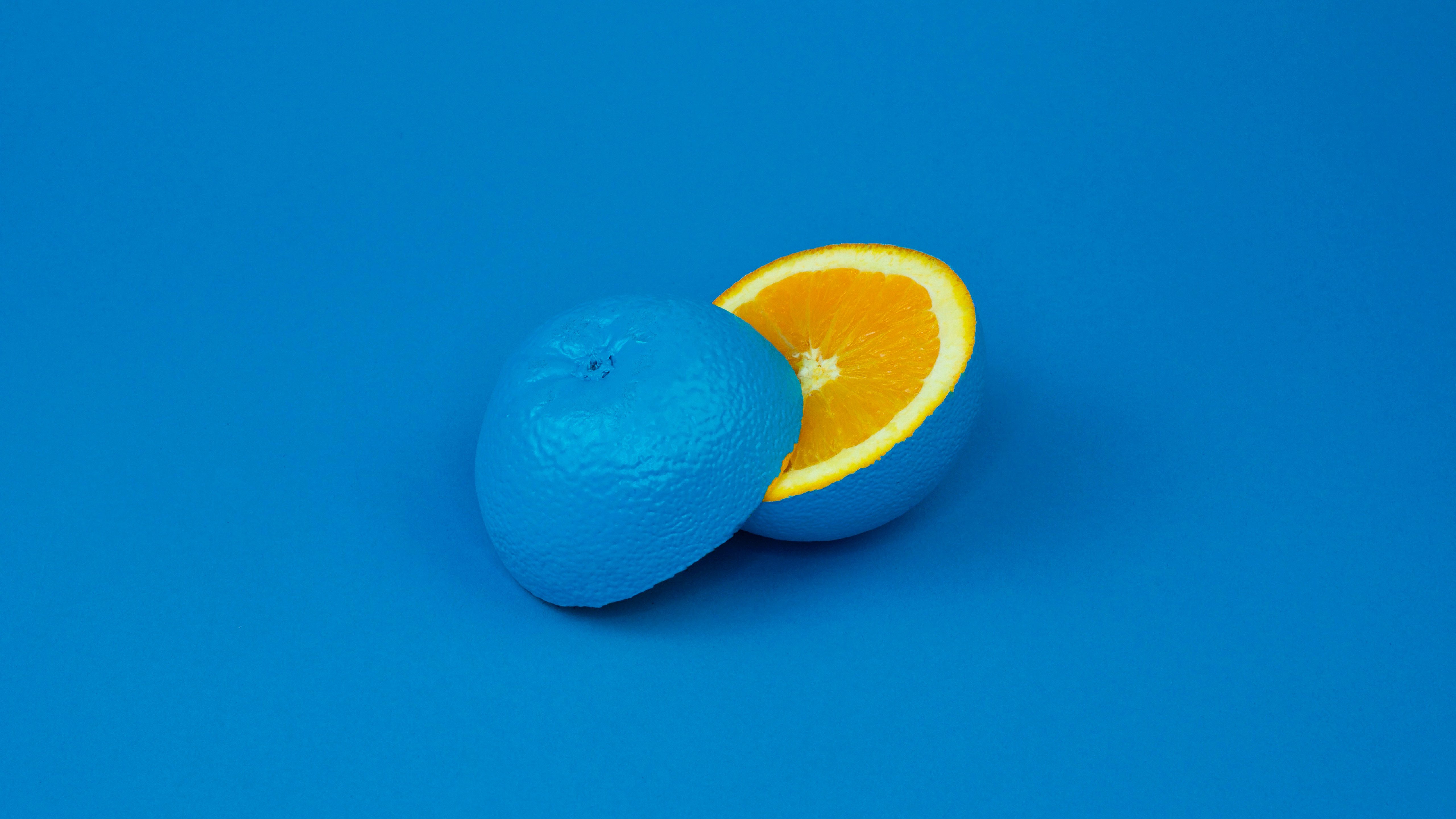 blue background, Orange (fruit) Wallpaper