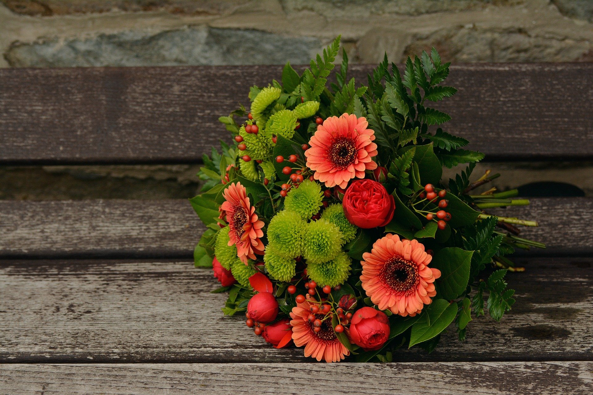 gerbera, Flowers, Bouquet, Leaves, Wooden surface Wallpaper