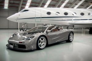 vehicle, Sports car, Car, McLaren F1, McLaren, Airplane, Hangar, Reflection