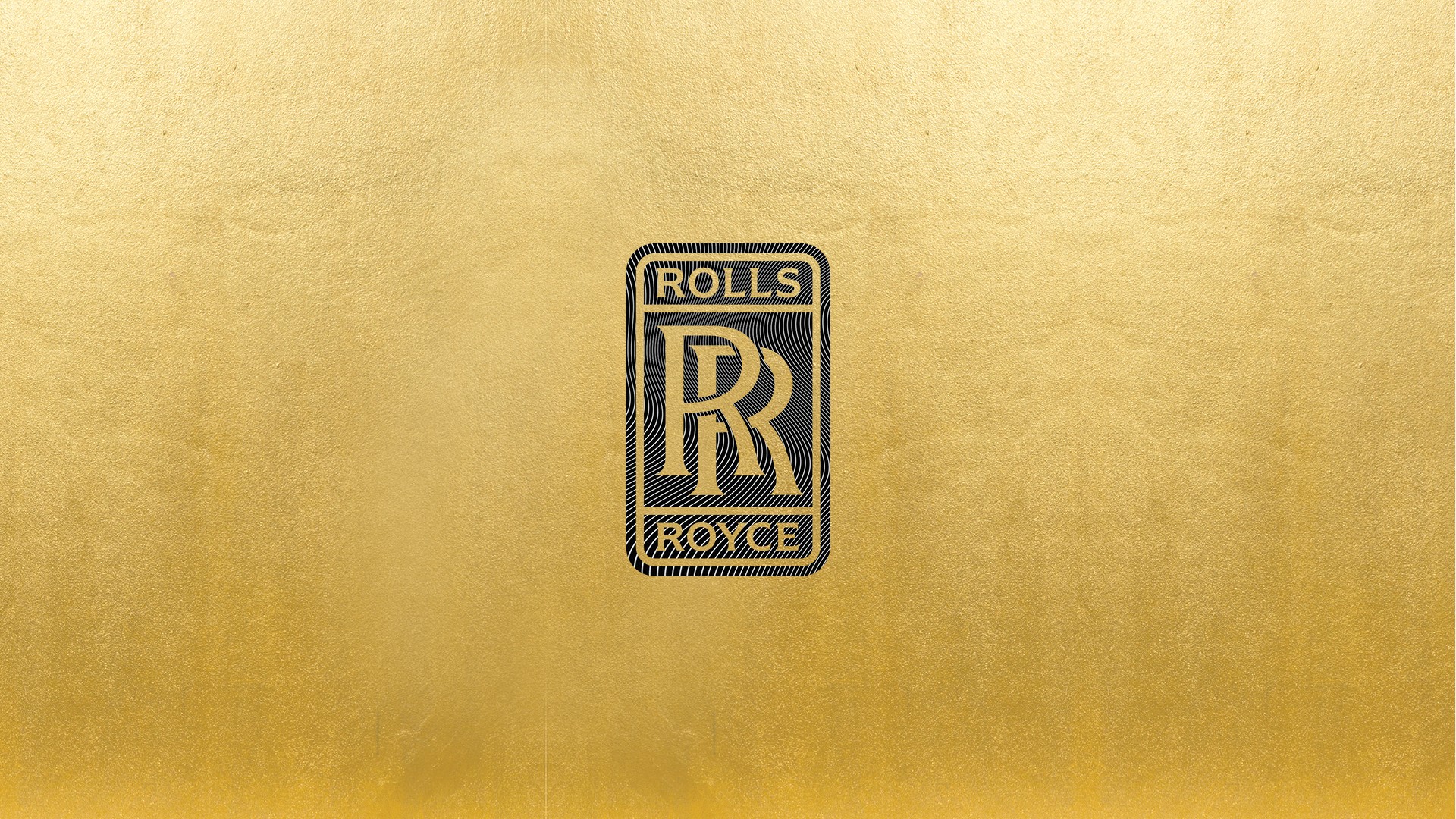 gold rolls royce car logo