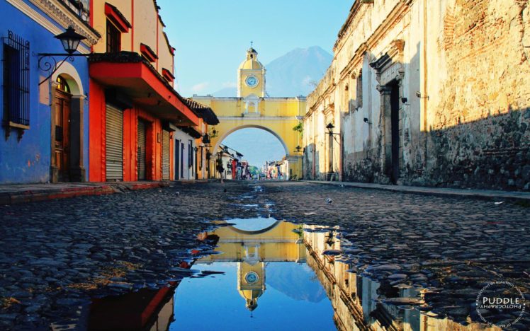 people, Guatemala, South America, Town, Street, Water, Cobblestone, Clocktowers, Old building, House, Arch, Mountains, Reflection, Watermarked HD Wallpaper Desktop Background