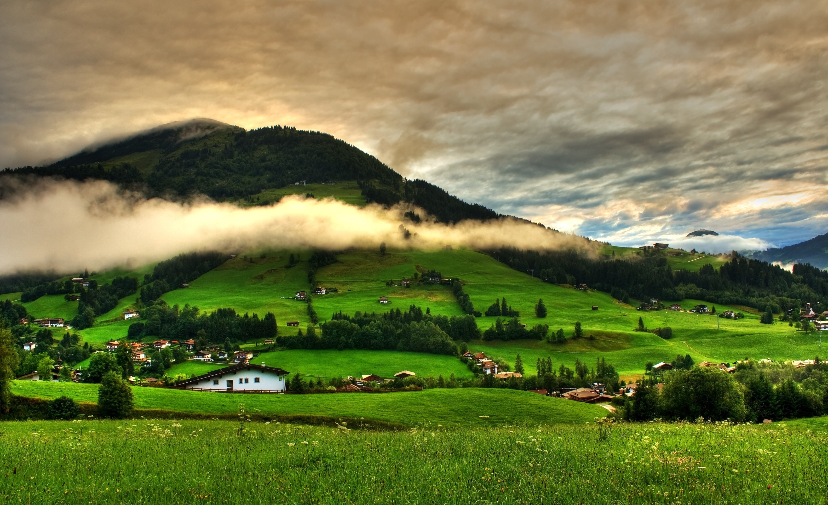 hills, Trees, Landscape, Grass, Clouds, Field, Village, Mountains, Greenery, Home, Sky Wallpaper