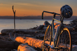 vehicles, Bicycle, Bike, Wheels, Frame, Mech, Spokes, Helmet, Hat, Sports, Landscapes, Beaches, Driftwood, Wood, Lakes, Water, Sunset, Sunrise, Sky, Clouds
