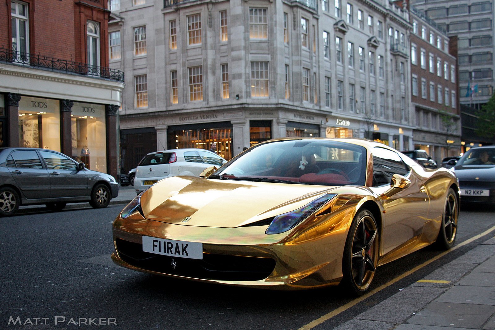 Ferrari 458 full wrapped in gold chrome w/ custom design b…