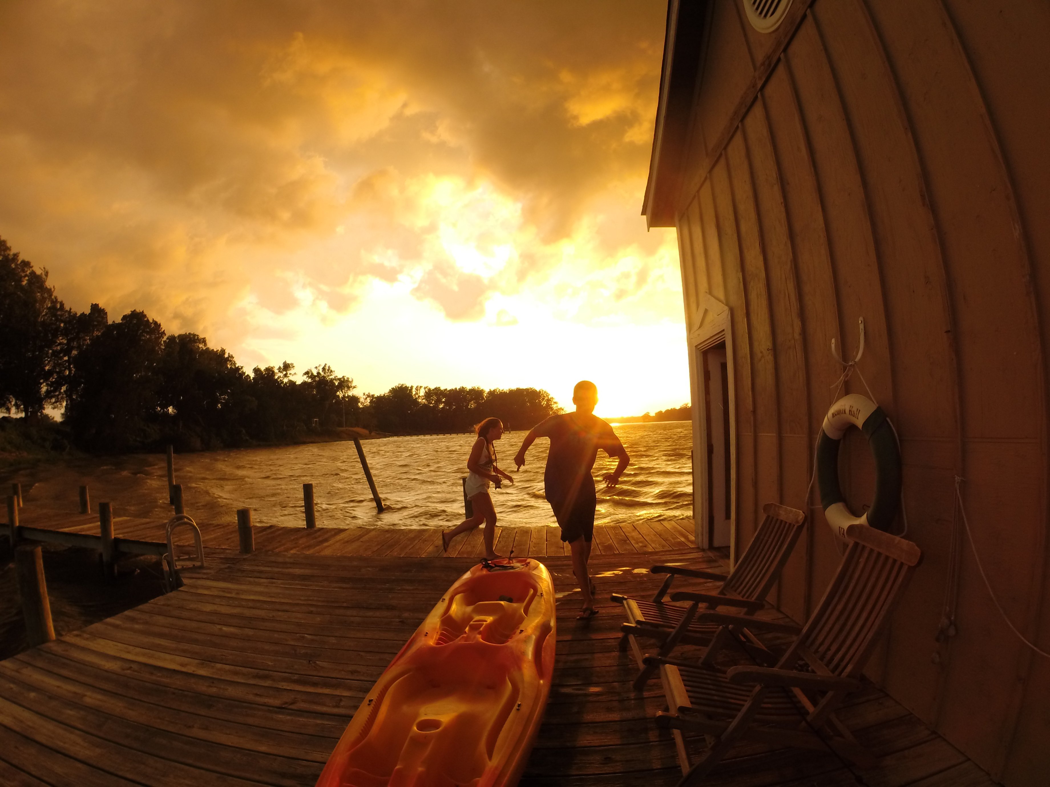 running, On, Lake, Dock, During, Sunset Wallpaper