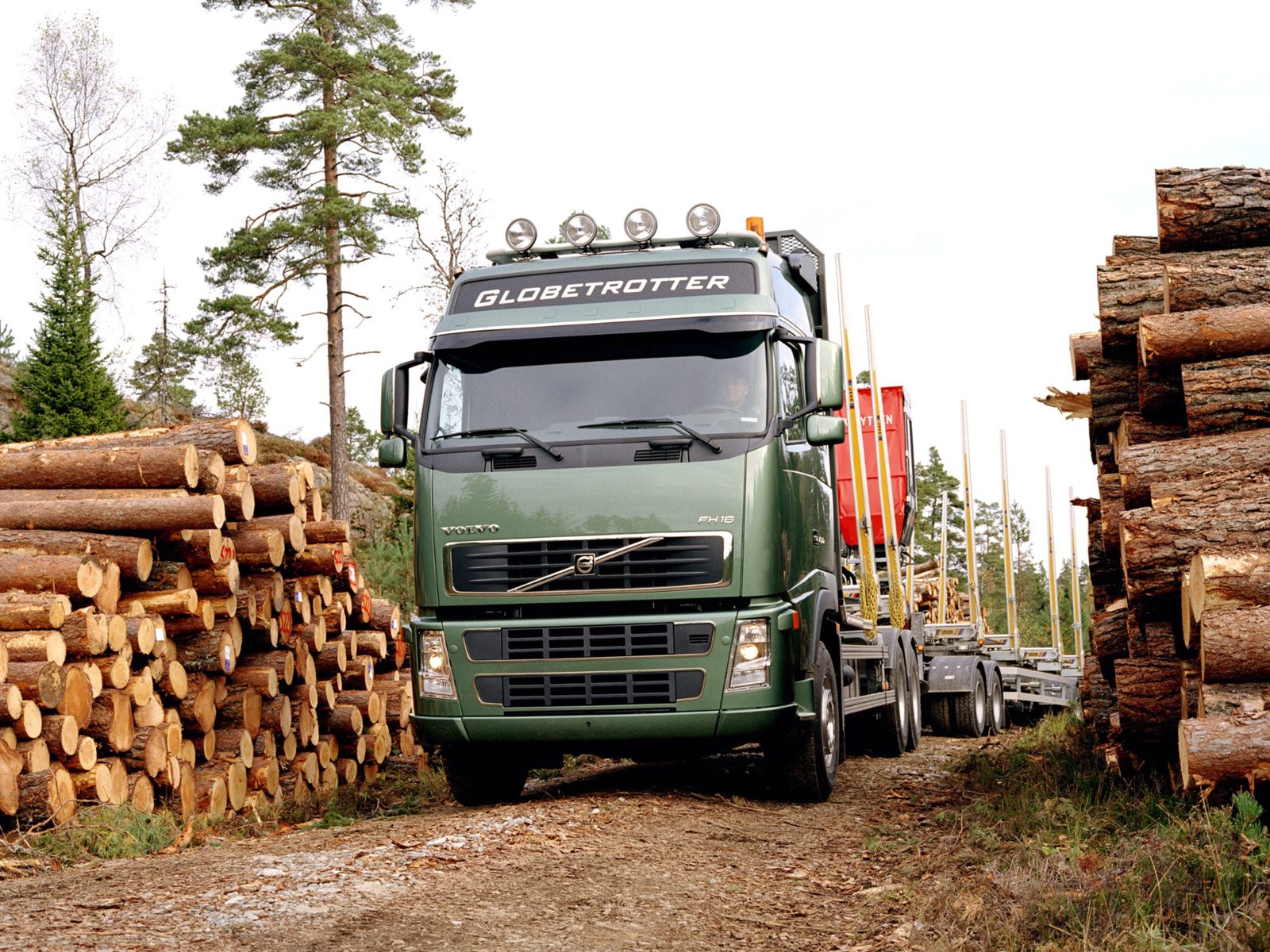 Грузовики лес. Вольво грузовик лесовоз. Volvo fh16 лесовоз. Вольво fh16 сортиментовоз. Volvo FH сортиментовоз.