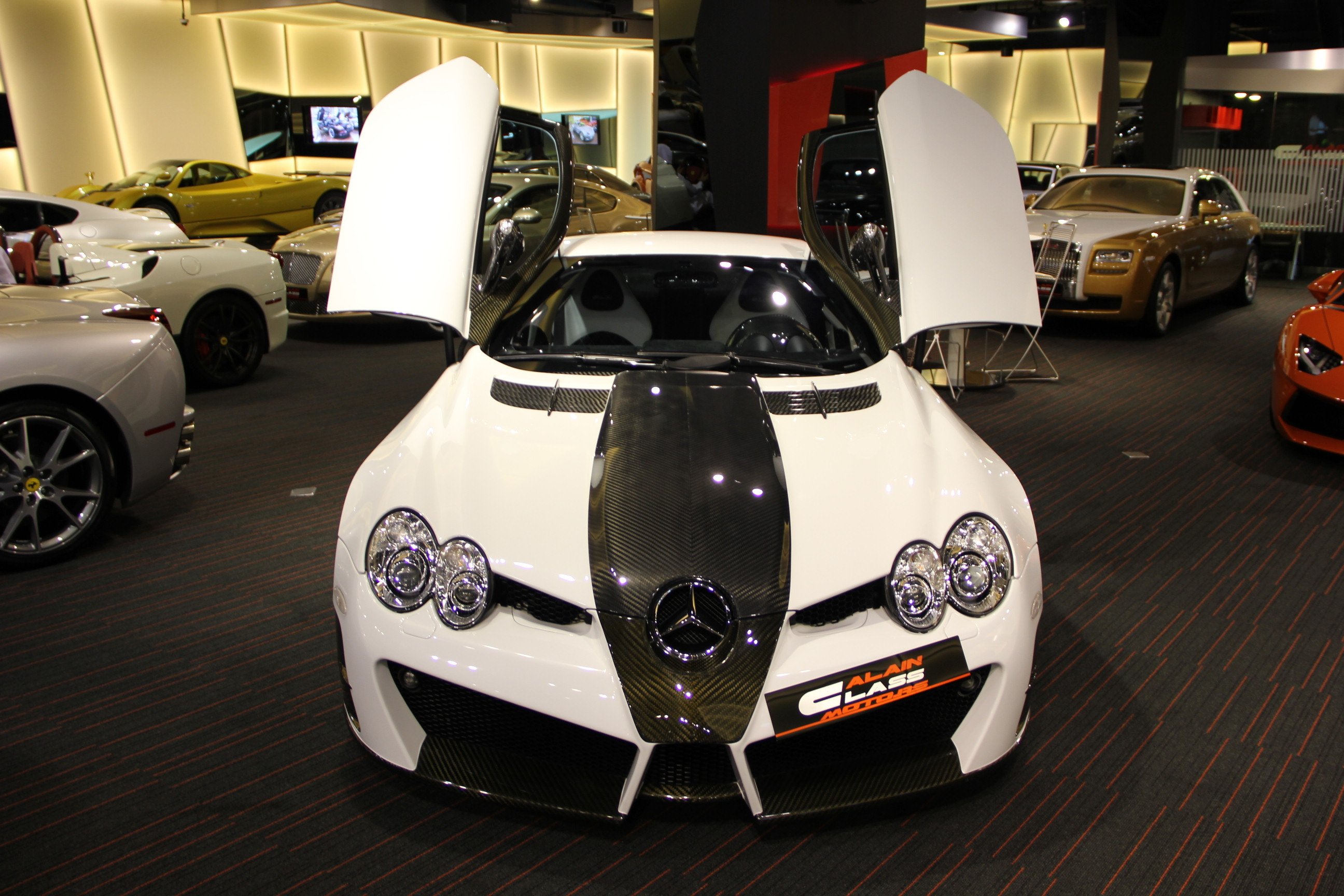 Class motors. SLR MCLAREN Mansory красный. Alain class SLR Roadster. Alain class Motors.